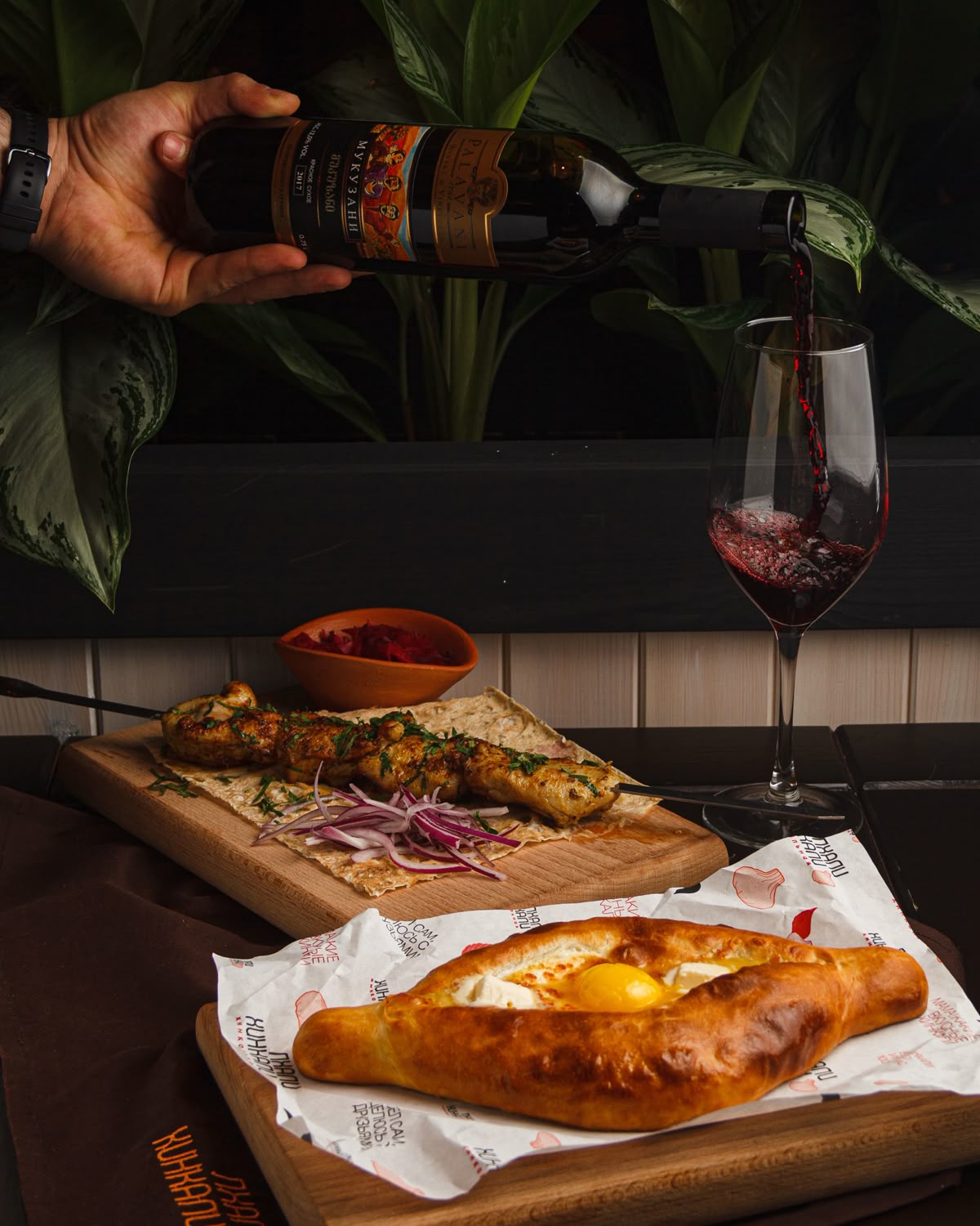 Delivery-style feast with grilled meat and khachapuri